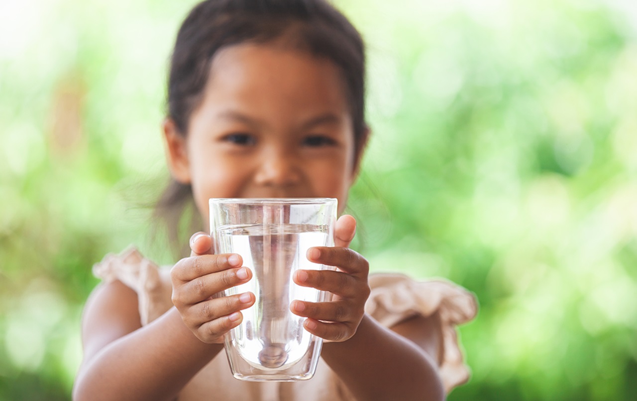 girl with glass of water