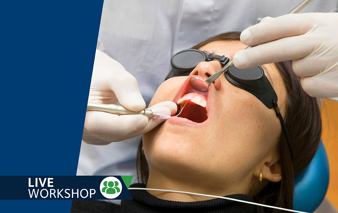 Diode dental laser being used to treat gums