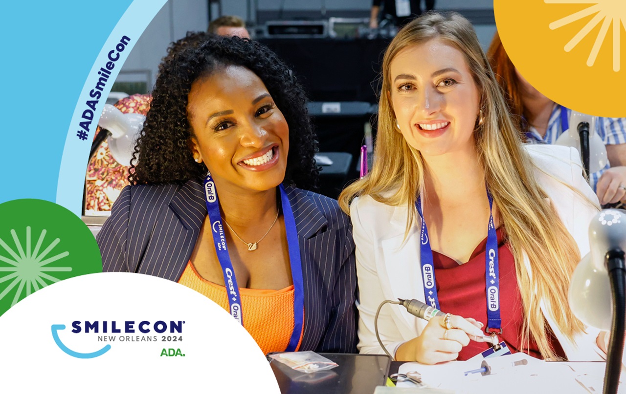 Two woman smiling during Smilecon