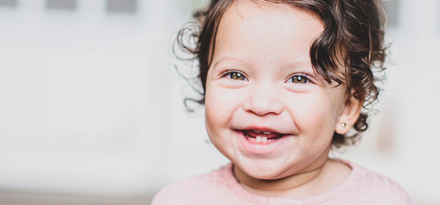 Baby with a few teeth.