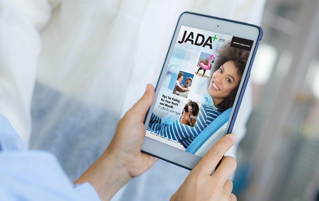 Someone holding tablet showing JADA