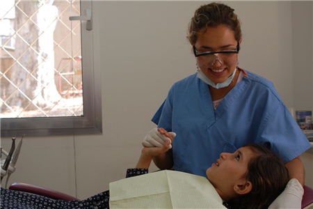 Dentist with patient