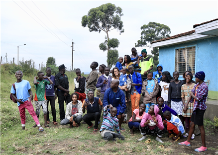 Group of patients waiting outside clinic